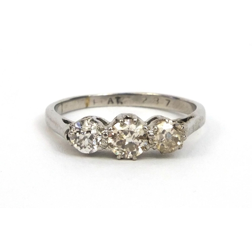 854 - Platinum three stone diamond ring, size K, approximate weight 2.7g