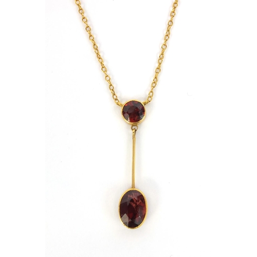 874 - 9ct gold garnet necklet, 46cm long, approximate weight 3.2g