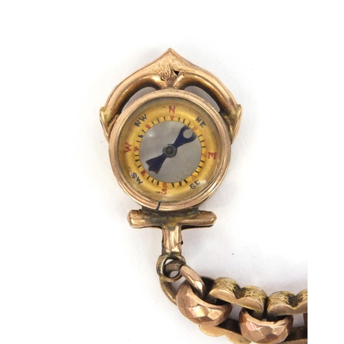 808 - Victorian unmarked gold watch chain with an anchor compass fob, 36cm long, approximate weight 44.6g