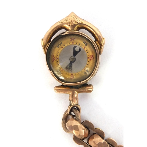 808 - Victorian unmarked gold watch chain with an anchor compass fob, 36cm long, approximate weight 44.6g