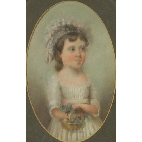 950 - Victorian oval pastel portrait of a girl holding a basket of flowers, mounted and gilt framed, 16cm ... 