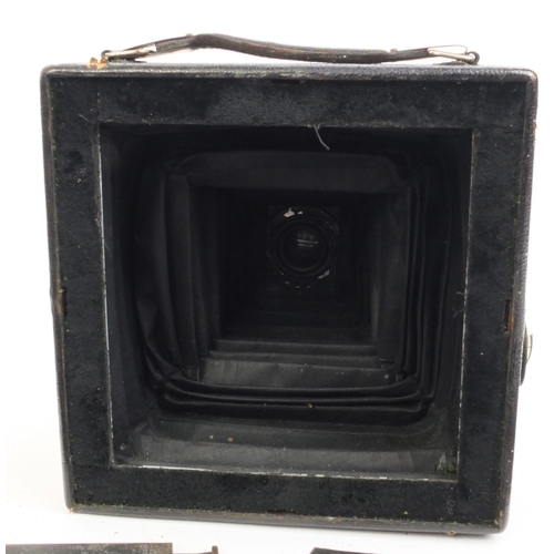 205 - Koilos Patent folding plate camera with metal plates, leather carrying case and a Imperial exposure ... 