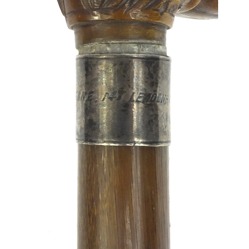 511 - Victorian Chinese rhino horn walking stick the rhino horn handle carved as a rhino's head, with silv... 