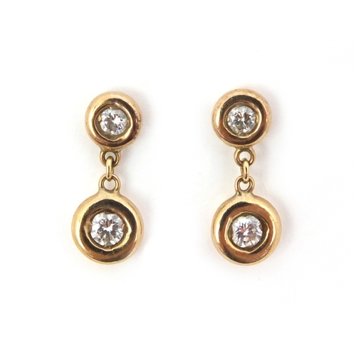 876 - Pair of unmarked gold diamond earrings, approximate weight 1.6g