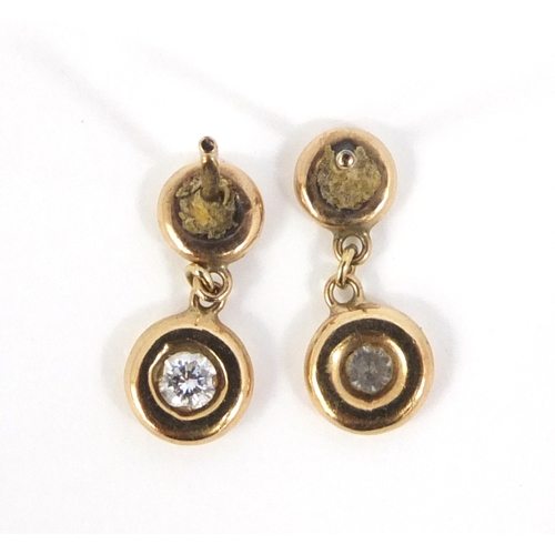 876 - Pair of unmarked gold diamond earrings, approximate weight 1.6g