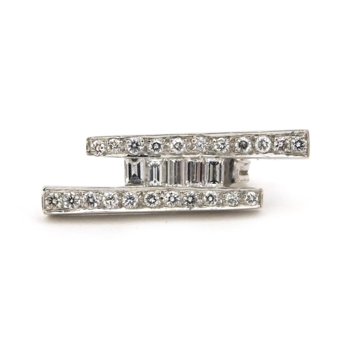 831 - Stylish 18ct white gold diamond ring, size G and matching earrings, approximate weight 10.6g