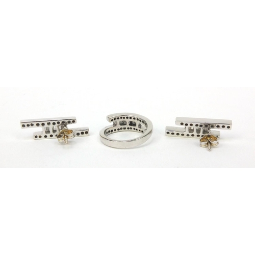 831 - Stylish 18ct white gold diamond ring, size G and matching earrings, approximate weight 10.6g