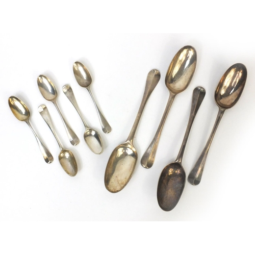 793 - Set of four Georgian silver table spoons and five teaspoons, the larger 20cm long, approximate weigh... 