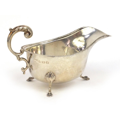 779 - Silver three footed sauce boat, hallmarked Birmingham 1931, 14cm long, approximate weight 82.8g