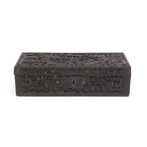 545 - Chinese Cantonese wooden glove box with hinged lid profusely carved with figures amongst pagodas and... 