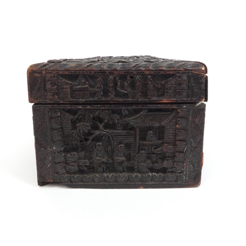 545 - Chinese Cantonese wooden glove box with hinged lid profusely carved with figures amongst pagodas and... 