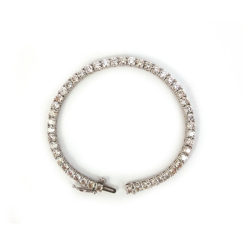 812 - 14ct white gold brilliant cut diamond bracelet, 18cm long, approximate weight 12.6g