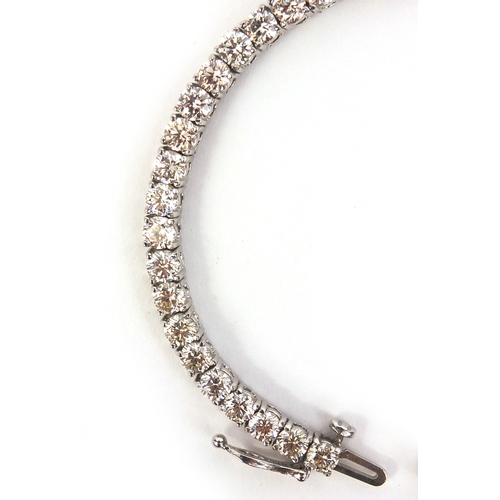 812 - 14ct white gold brilliant cut diamond bracelet, 18cm long, approximate weight 12.6g