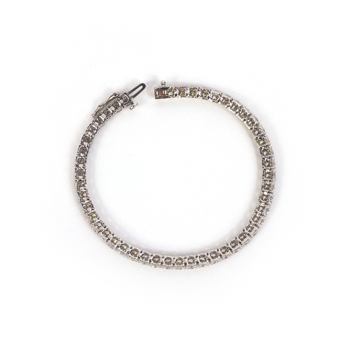 812 - 14ct white gold brilliant cut diamond bracelet, 18cm long, approximate weight 12.6g