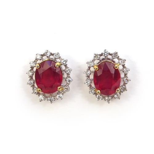 815 - Pair of 18ct white gold ruby and diamond earrings, 1.5cm long, approximate weight 4.8g