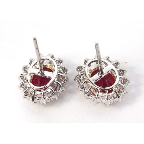 815 - Pair of 18ct white gold ruby and diamond earrings, 1.5cm long, approximate weight 4.8g