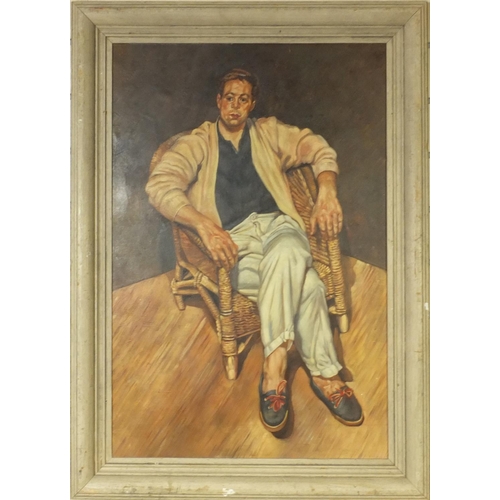 2194 - Oil onto board portrait of a man seated in a wicker chair, framed, 75cm x 50cm excluding the frame