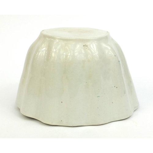 2148 - Victorian corner flower Blanc-Mange porcelain jelly mould, 12cm high