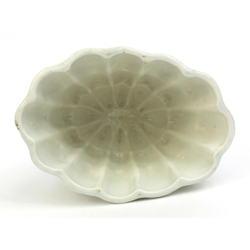 2148 - Victorian corner flower Blanc-Mange porcelain jelly mould, 12cm high