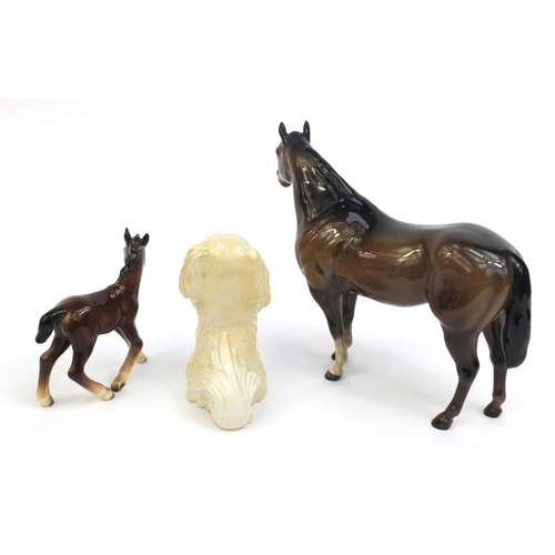 2116 - Group of three Beswick animals comprising a quarter horse, foal and a dog, factory marks to the base... 
