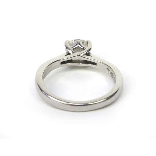 811 - LEO platinium modern round brilliant cut diamond solitaire ring, stamped 0.9 to the band, numbered 1... 