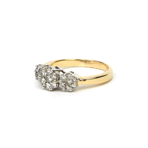 850 - Unmarked gold modern round brilliant cut diamond triple flowerhead ring, size S, approximate weight ... 