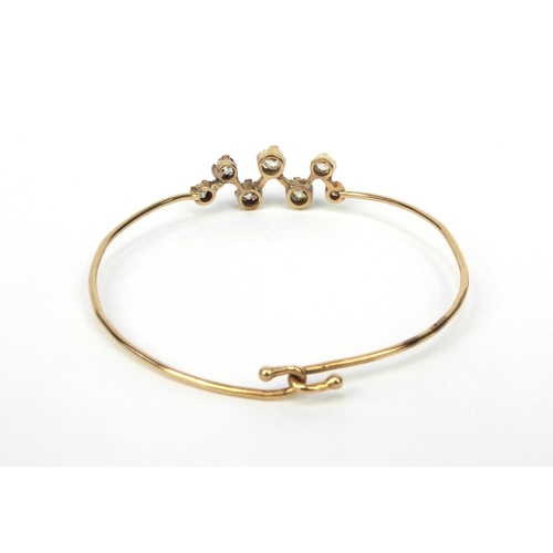 880 - Unmarked gold seven stone old Europeon cut diamond bracelet, approximately 5.5cm diameter, approxima... 