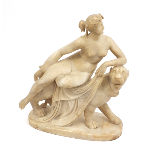 32A - 19th century carved marble figure of Una and the Lion from Spencer's Faerie Queene, 40cm high