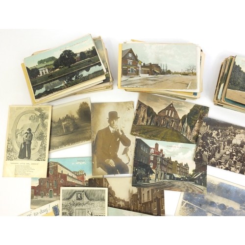225 - Group of postcards including topographical views and shipping scenes