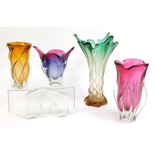 2304 - Group of glassware comprising Kosta Boda swan paperweight and four colourful art glass bowls, the ta... 