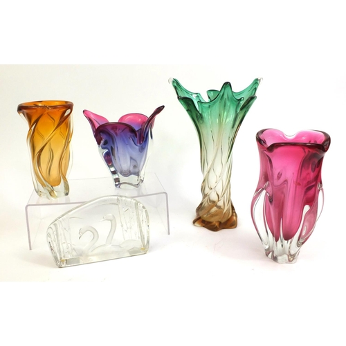 2304 - Group of glassware comprising Kosta Boda swan paperweight and four colourful art glass bowls, the ta... 