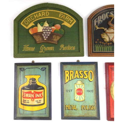 2182 - Five wooden advertising wall plaques comprising Swan ink, Brasso, Pear soap, Frogs legs and Orchard ... 