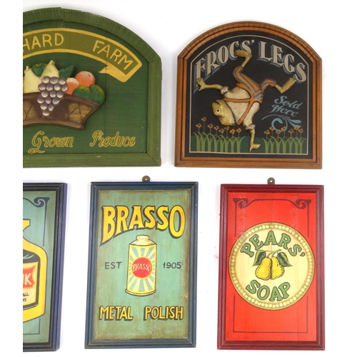 2182 - Five wooden advertising wall plaques comprising Swan ink, Brasso, Pear soap, Frogs legs and Orchard ... 