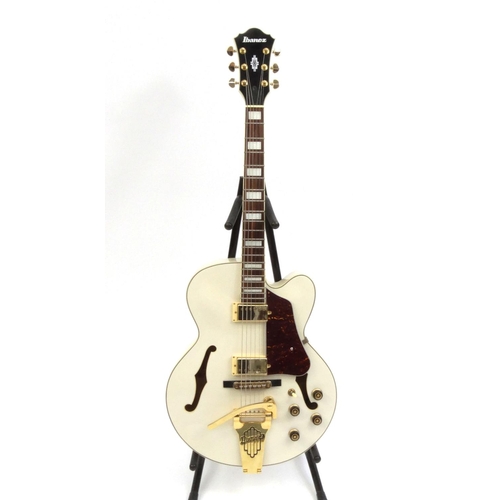 2072 - Ibanez six string acoustic guitar, model No. AF75TDG-IV-12-04, serial No. S13061904, 107cm high