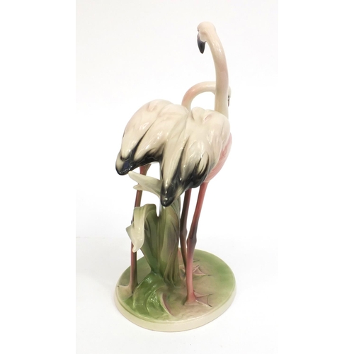 2204 - Keramos hand painted flamingo group, factory marks to the base, 31cm high