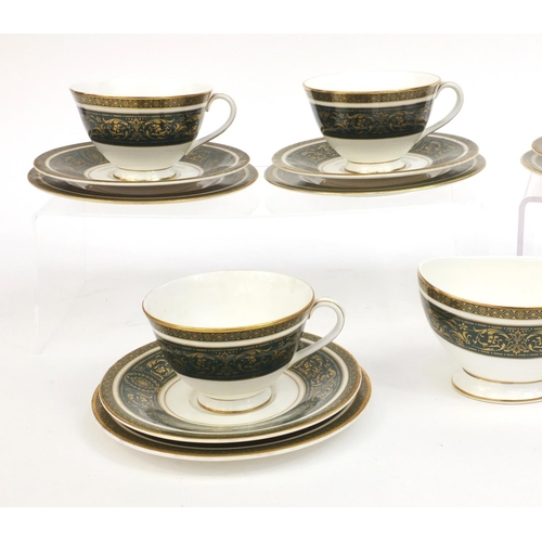 2257 - Six Royal Doulton Vanborough pattern trios, together with a matching sugar bowl, each with factory m... 