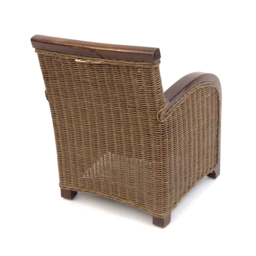 2052 - Childs wicker arm chair, 54cm high