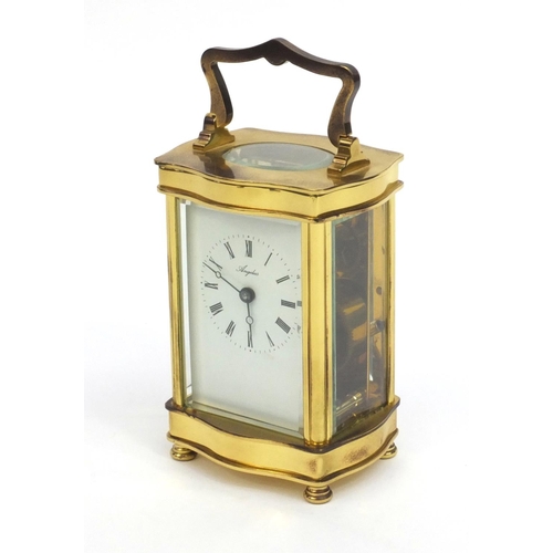 2336 - Angelus brass cased carriage clock, with roman numerals and key, 12cm high excluding the handle