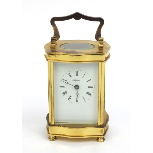 2336 - Angelus brass cased carriage clock, with roman numerals and key, 12cm high excluding the handle