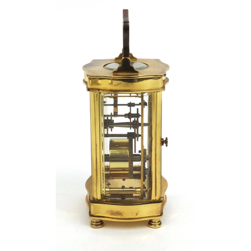 2336 - Angelus brass cased carriage clock, with roman numerals and key, 12cm high excluding the handle