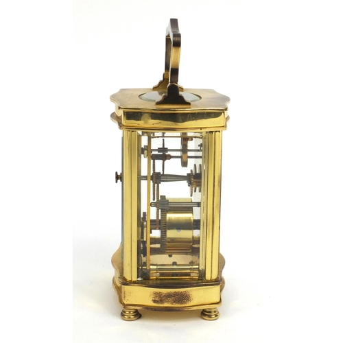 2336 - Angelus brass cased carriage clock, with roman numerals and key, 12cm high excluding the handle