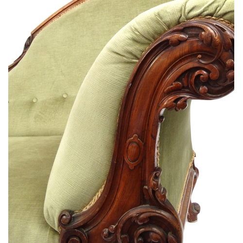 2014 - Victorian carved walnut chaise lounge with green upholstery, 94cm high x 200cm wide x 75cm deep