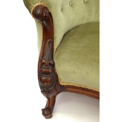 2014 - Victorian carved walnut chaise lounge with green upholstery, 94cm high x 200cm wide x 75cm deep