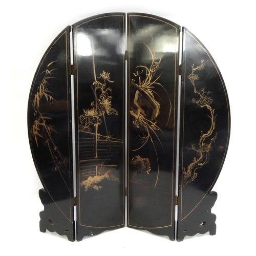 2025 - Oriental black lacquer four fold screen, decorated in relief with geisha girls and hand painted with... 