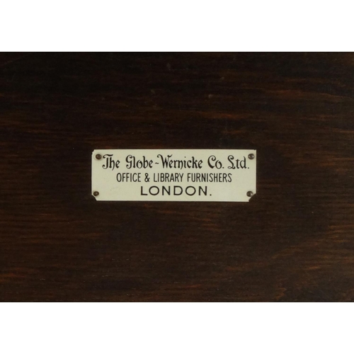 2003 - Oak Globe Wernicke five section bookcase with original labels, 175cm high x 86cm wide x 38cm deep