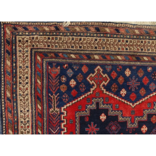 2020 - Rectangular Middle Eastern rug with geometric border and central filled, 223cm x 173cm