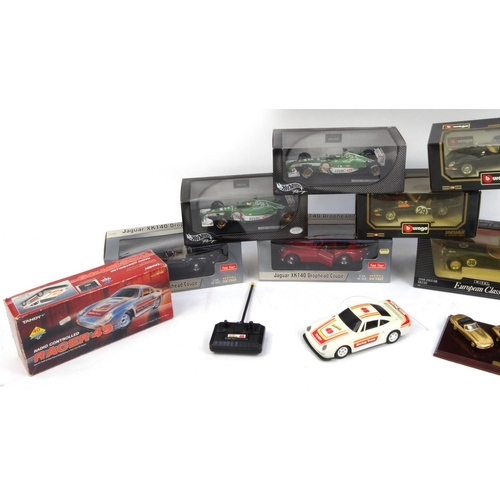 2281 - Collection of boxed 1:18 scale model Jaguars including Hot Wheels, Ertl, Burago examples, together w... 