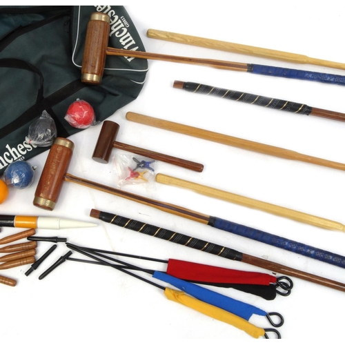 2295 - Winchester croquet set with four extra mallets, each mallet 95cm long