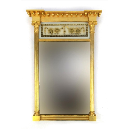 2275 - Gilt pier mirror with white glass panel decorated with gilt flowers, 83cm x 54cm