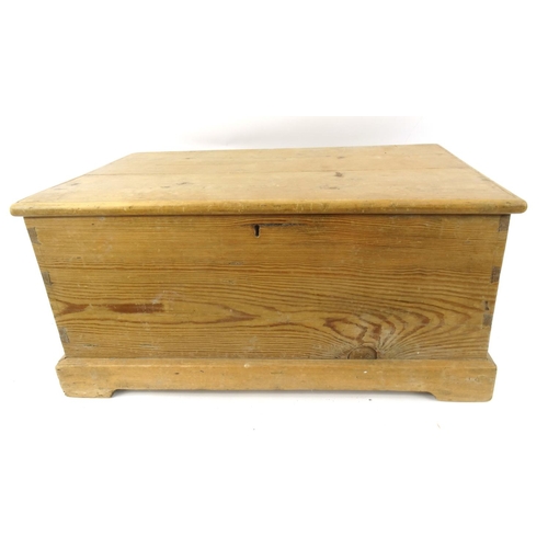 35A - Pine trunk with hinged lid and iron handles, 41cm high x 83cm wide 50cm deep